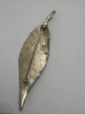 vintage silver-tone textured leaf brooch signed by BSK